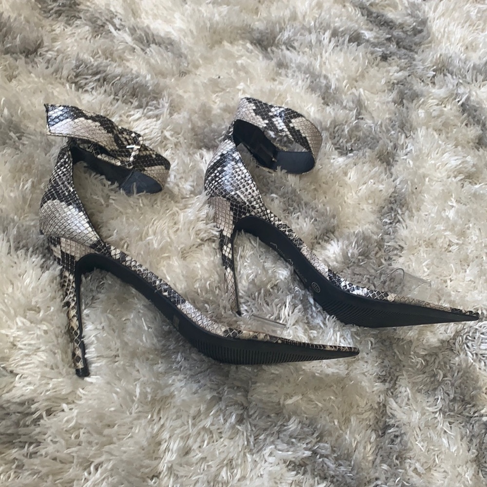 Anne Michelle snake skins heel. Clear strap.